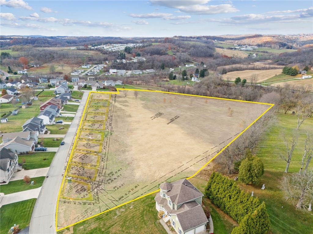 148 Sharon Drive Pleasant Unity, PA 15676 - Photo 3 of 5 an aerial view of residential houses with outdoor space