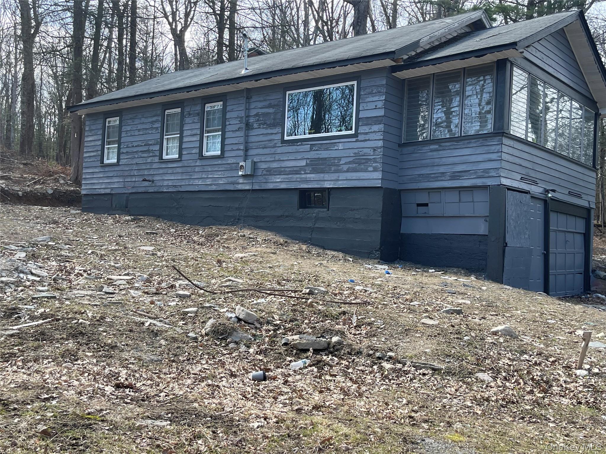 20 Jersey Road Wurtsboro, NY 12790 - Photo 1 of 3 a house view with a backyard space