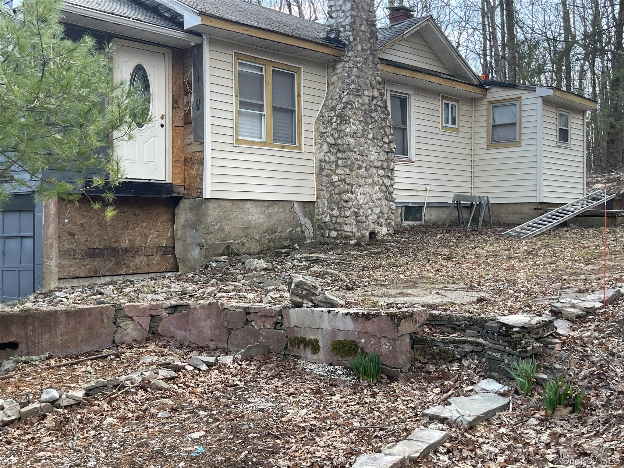 20 Jersey Road Wurtsboro, NY 12790 - Photo 2 of 3 a view of a house with a yard