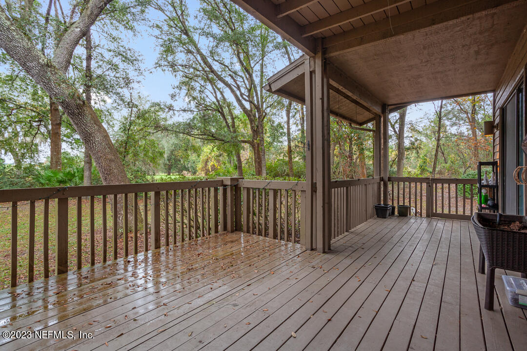 3165 Ravines Road, Unit 3604 Middleburg, FL 32068 - Photo 14 of 16 a view of wooden deck