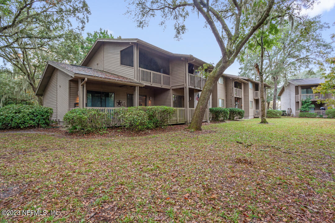 3165 Ravines Road, Unit 3604 Middleburg, FL 32068 - Photo 15 of 16 a front view of a house with a yard