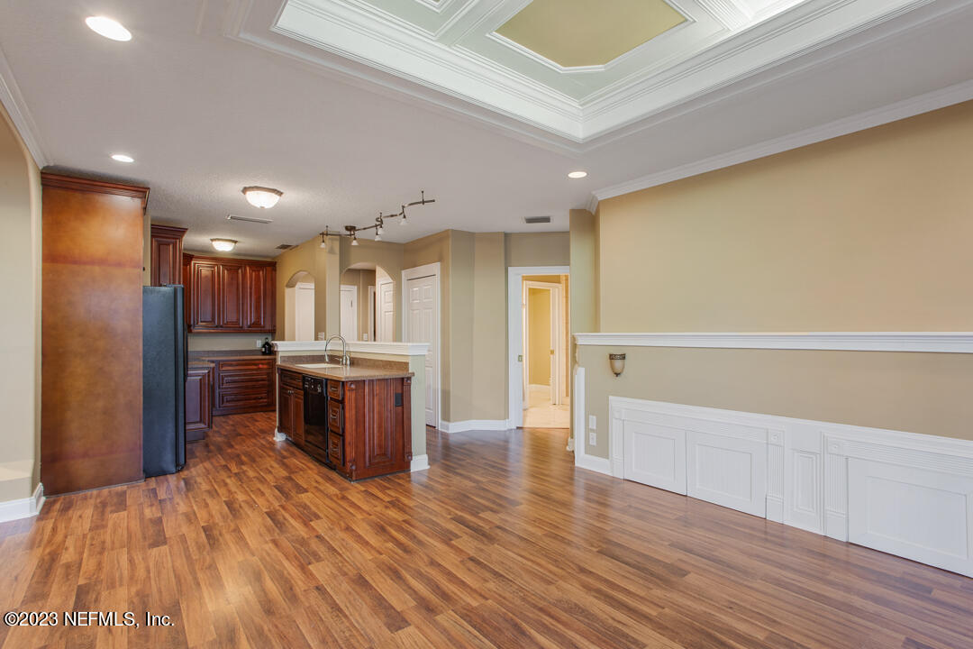 3165 Ravines Road, Unit 3604 Middleburg, FL 32068 - Photo 5 of 16 a view of kitchen with wooden floor