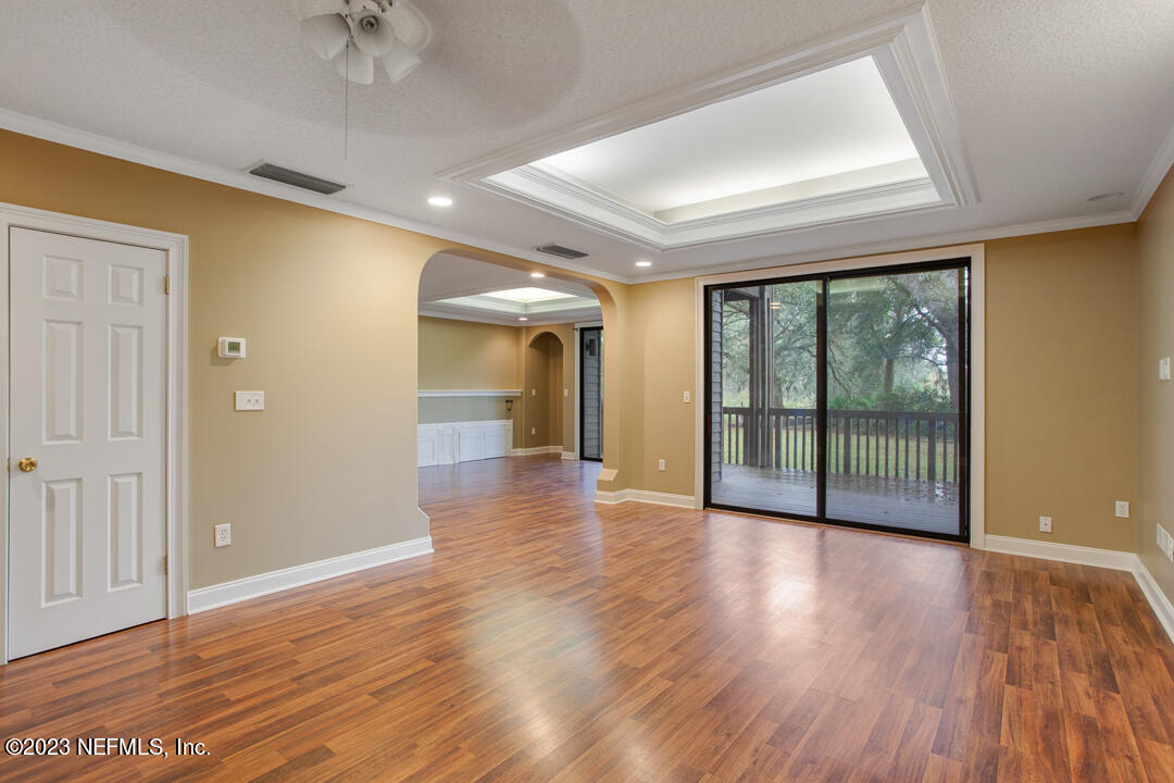 3165 Ravines Road, Unit 3604 Middleburg, FL 32068 - Photo 8 of 16 a view of an entryway with wooden floor
