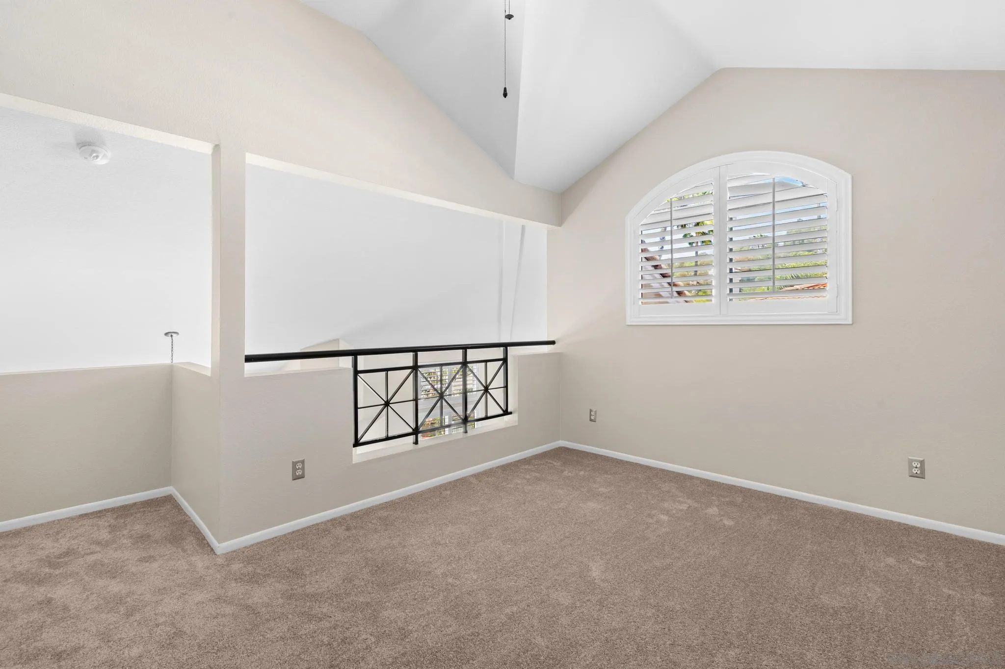 9338 Babauta Road, Unit 78 San Diego, CA 92129 - Photo 10 of 26 an empty room with windows