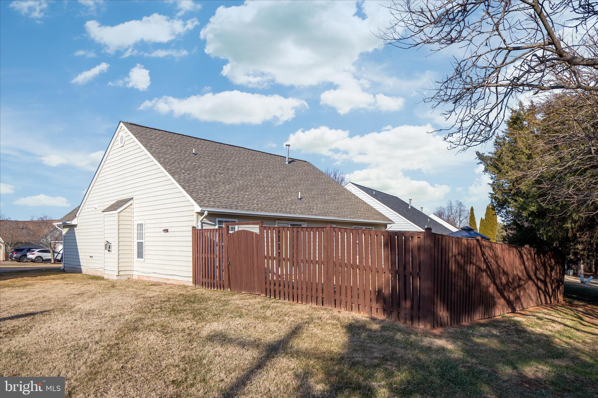 776 Ripplebrook Drive Culpeper, VA 22701 - Photo 26 of 30 a backyard of a house with wooden fence