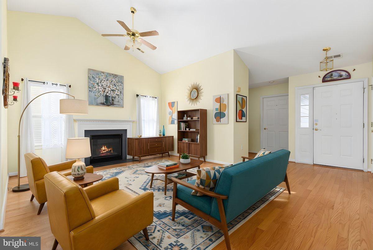 776 Ripplebrook Drive Culpeper, VA 22701 - Photo 4 of 30 a living room with furniture and a fireplace