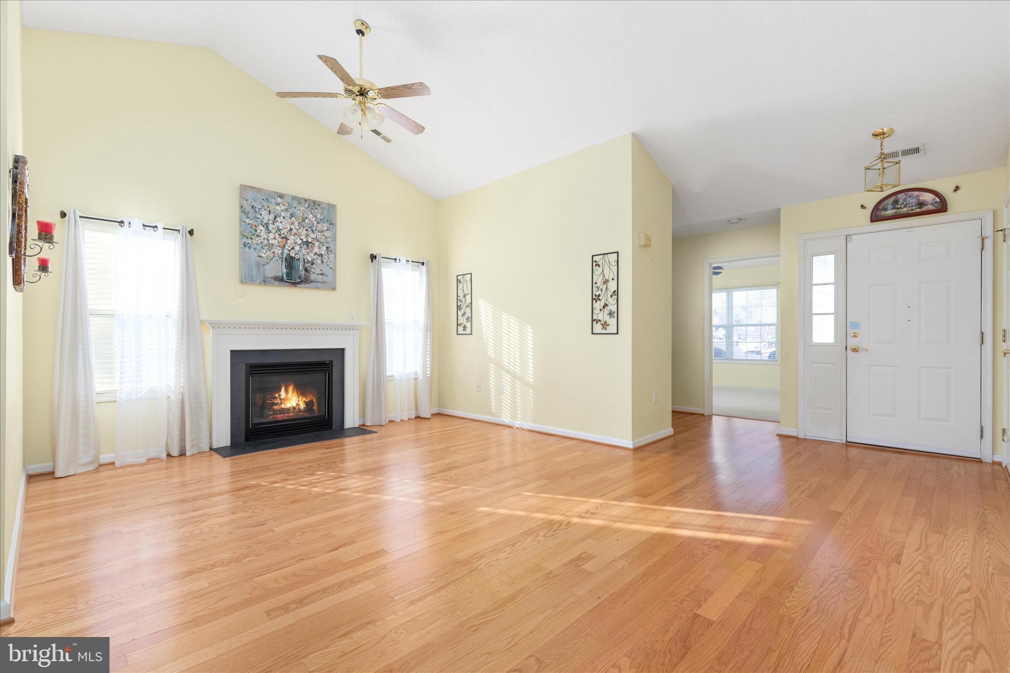 776 Ripplebrook Drive Culpeper, VA 22701 - Photo 6 of 30 a view of an empty room with a fireplace and a window