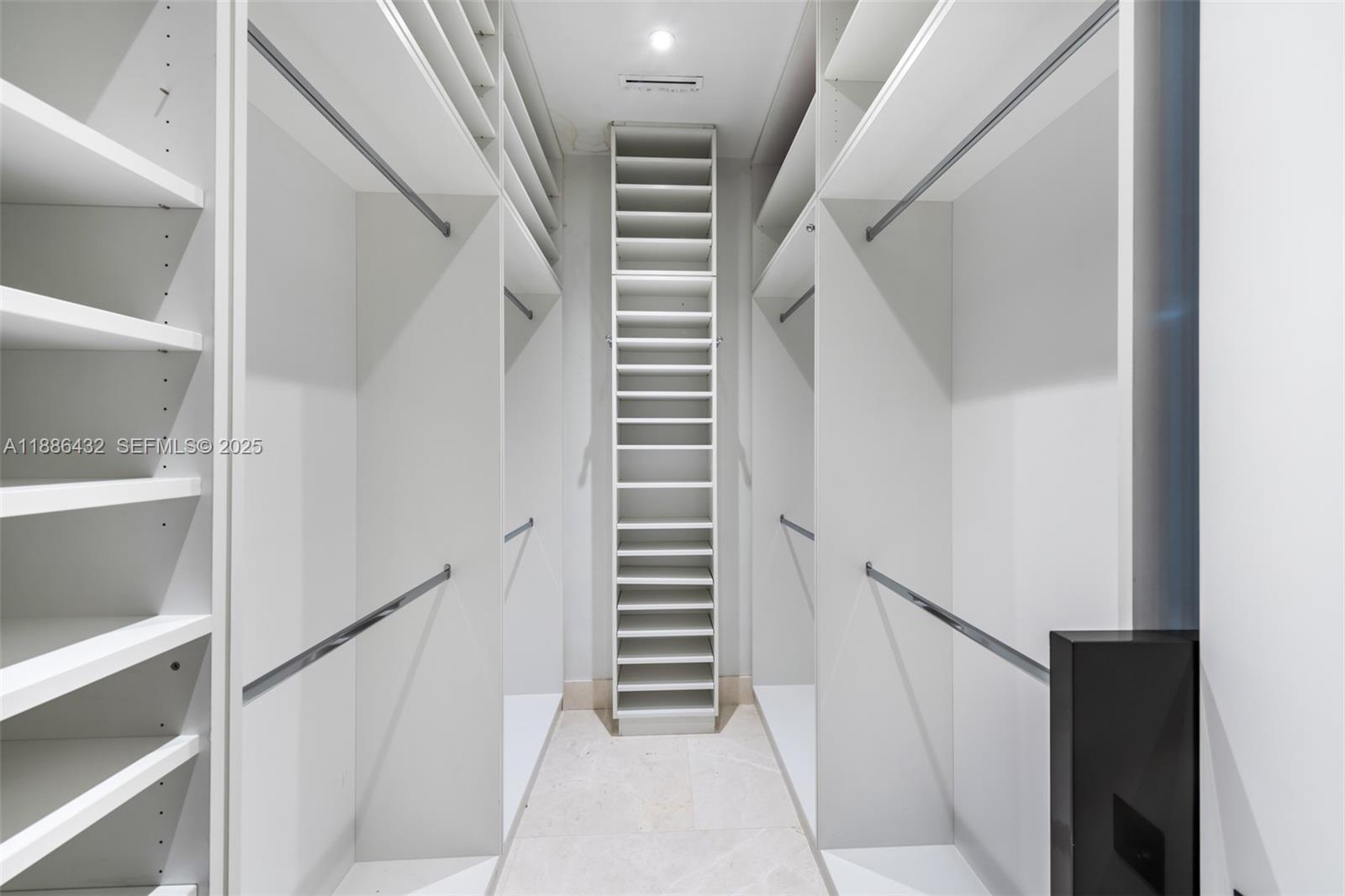 4675 Northeast 2nd Avenue Miami, FL 33137 - Photo 18 of 44 a view of staircase with white walls and a window