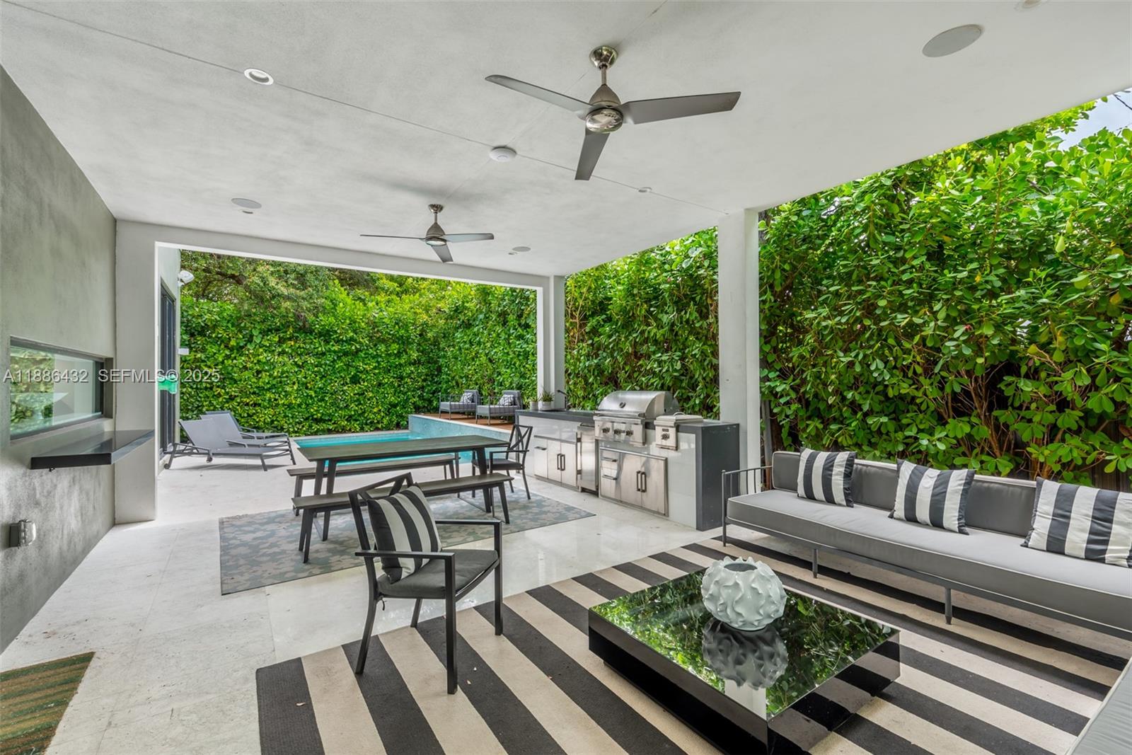 4675 Northeast 2nd Avenue Miami, FL 33137 - Photo 36 of 44 a view of a patio with furniture