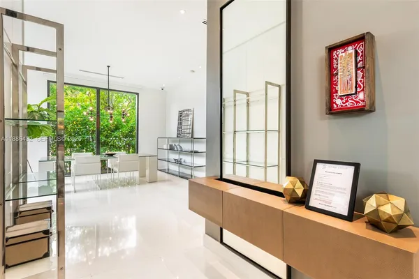 a view of a kitchen with a large window