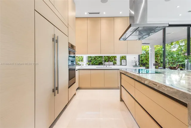 a view of a living room and dining room with furniture