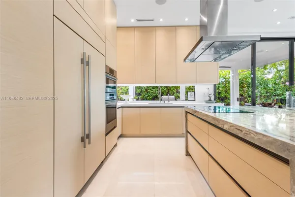 a view of a living room and dining room with furniture