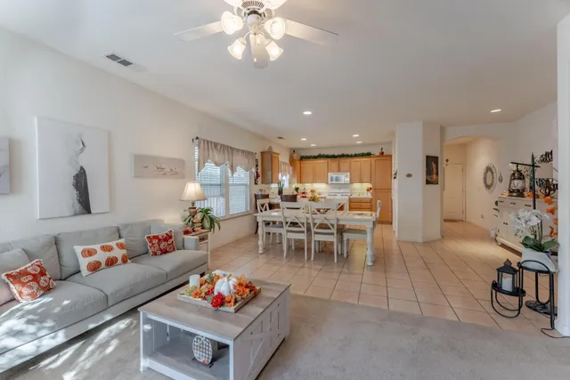 a bedroom with a bed and a television