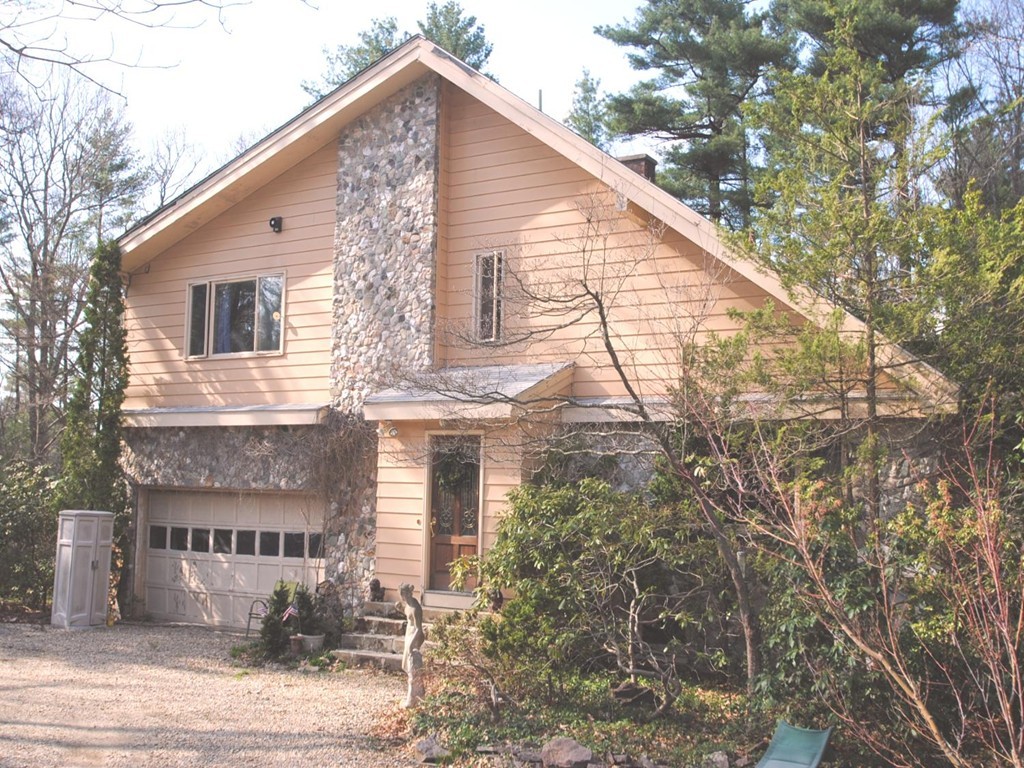 6 Algonquin Road Canton, MA 02021 - Photo 1 of 24 a view of a house with a yard