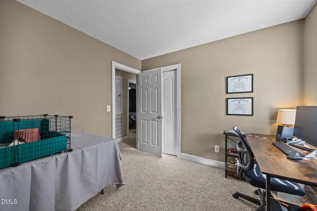 a workspace with furniture and window