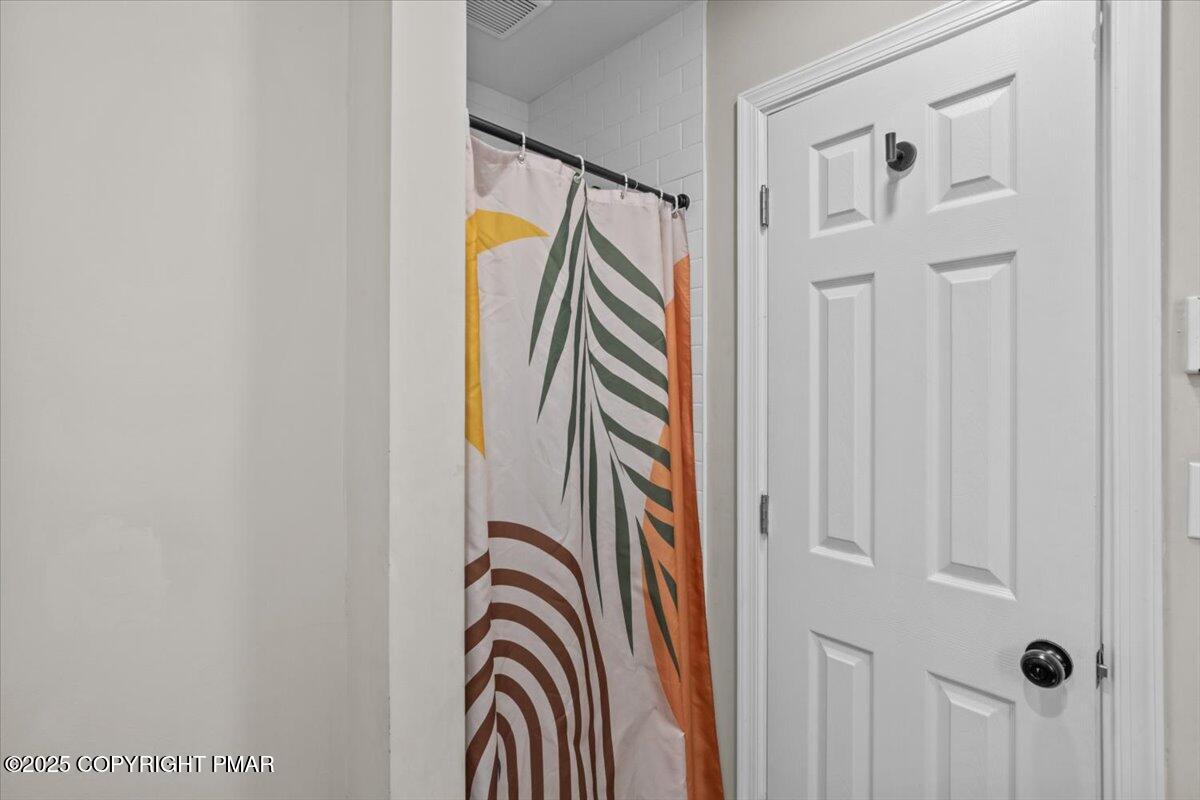 415 Canterbury Road Bushkill, PA 18324 - Photo 13 of 36 a view of a bedroom from the hallway