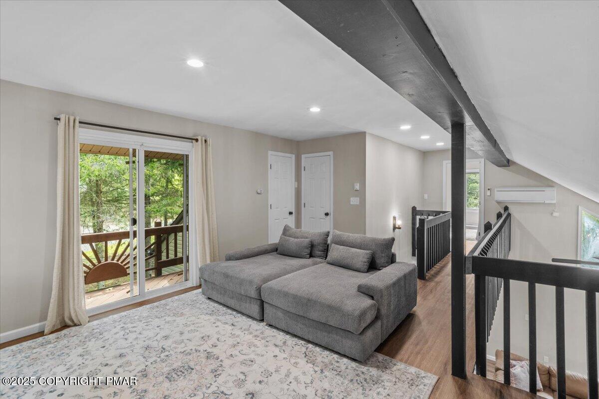 415 Canterbury Road Bushkill, PA 18324 - Photo 21 of 36 a living room with furniture and a window