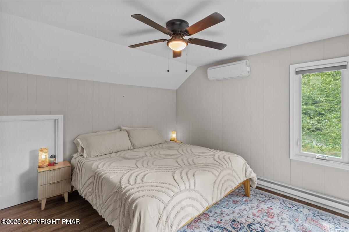 415 Canterbury Road Bushkill, PA 18324 - Photo 24 of 36 a bedroom with a bed and window