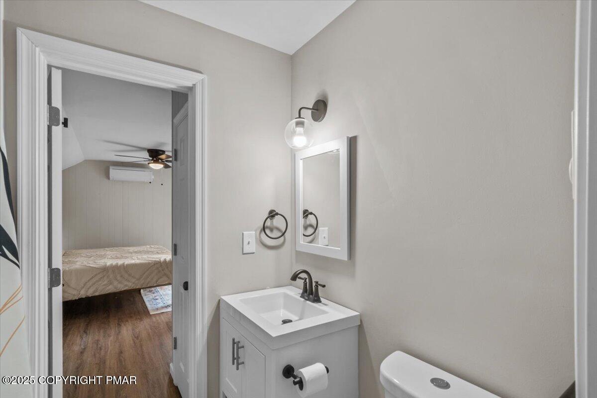 415 Canterbury Road Bushkill, PA 18324 - Photo 25 of 36 a bathroom with a sink a toilet and shower