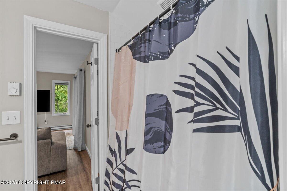 415 Canterbury Road Bushkill, PA 18324 - Photo 26 of 36 a view of entryway and hall with wooden floor