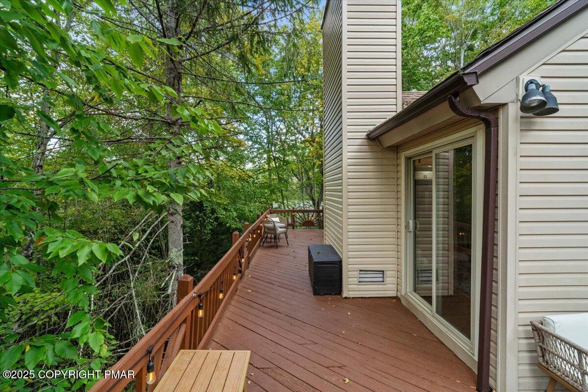 415 Canterbury Road Bushkill, PA 18324 - Photo 34 of 36 a balcony with wooden floor and outdoor space