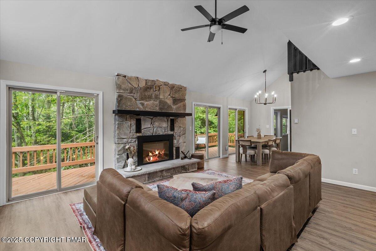 415 Canterbury Road Bushkill, PA 18324 - Photo 5 of 36 a living room with furniture and a fireplace