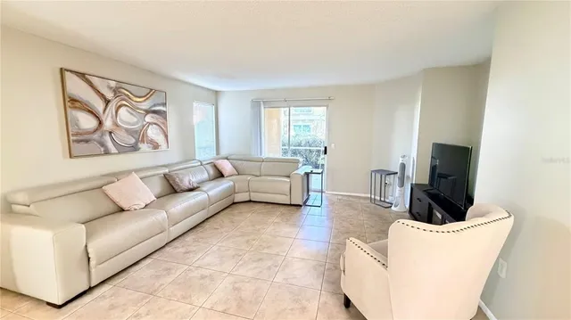 a living room with furniture and a couch