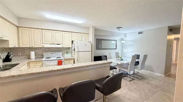 a view of a house with porch and wooden floor
