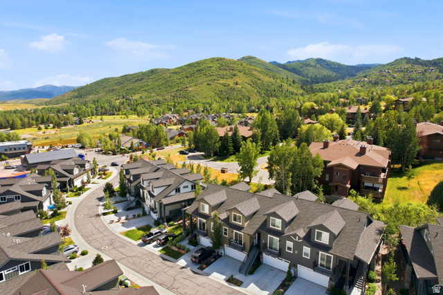 3355 Santa Fe Road Park City, UT 84098 - Photo 41 of 45 Residential community featuring a curved street, multiple townhomes with dormer windows, and attached garages