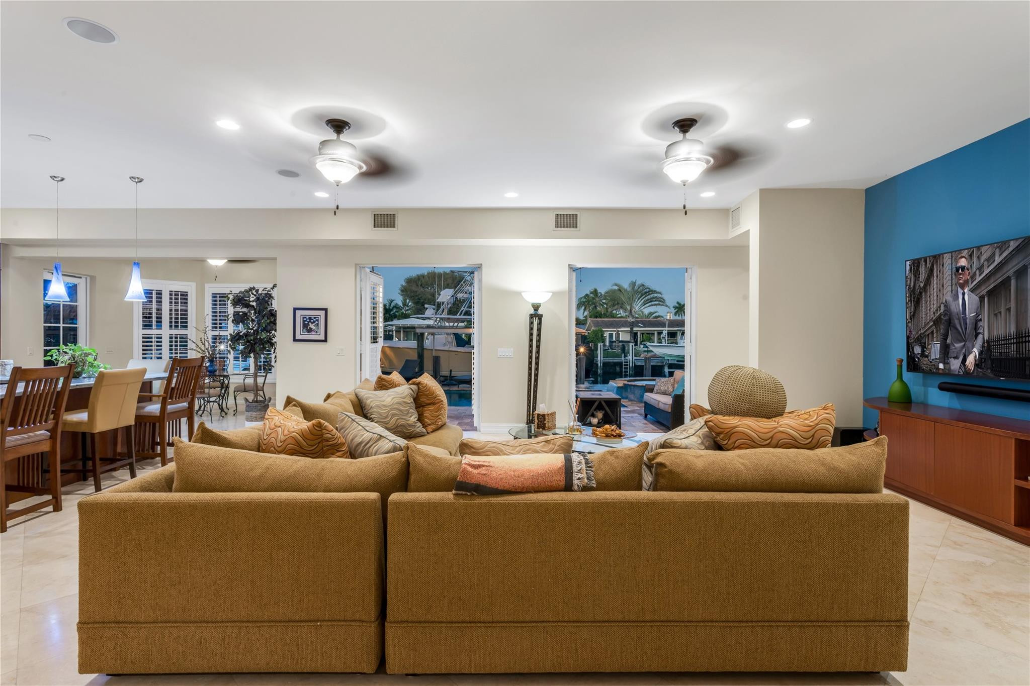3489 Northeast 30th Avenue Lighthouse Point, FL 33064 - Photo 22 of 42 a living room with furniture and wooden floor