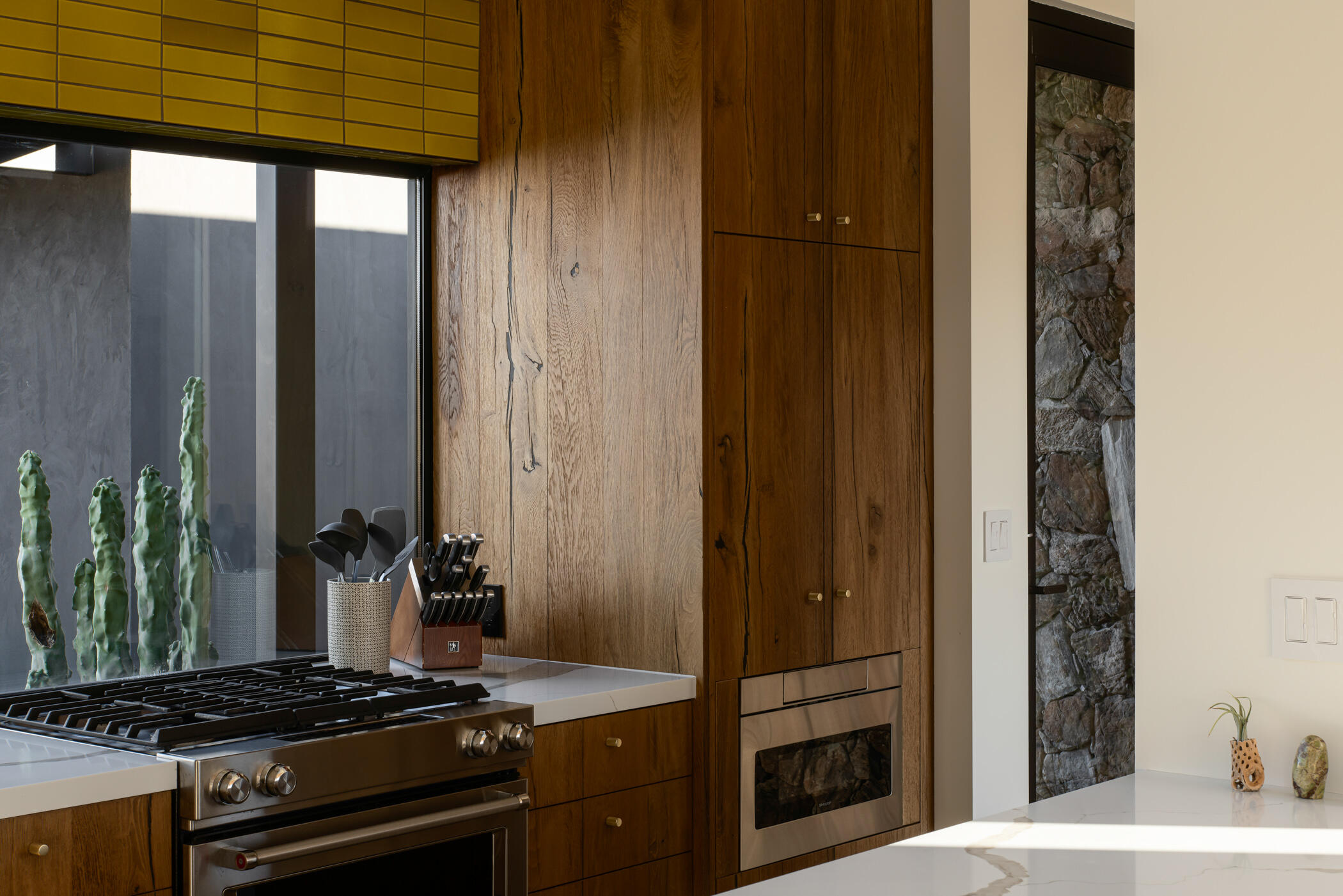 8520 Purple Sage Road Joshua Tree, CA 92252 - Photo 15 of 36 a kitchen with a refrigerator and a stove