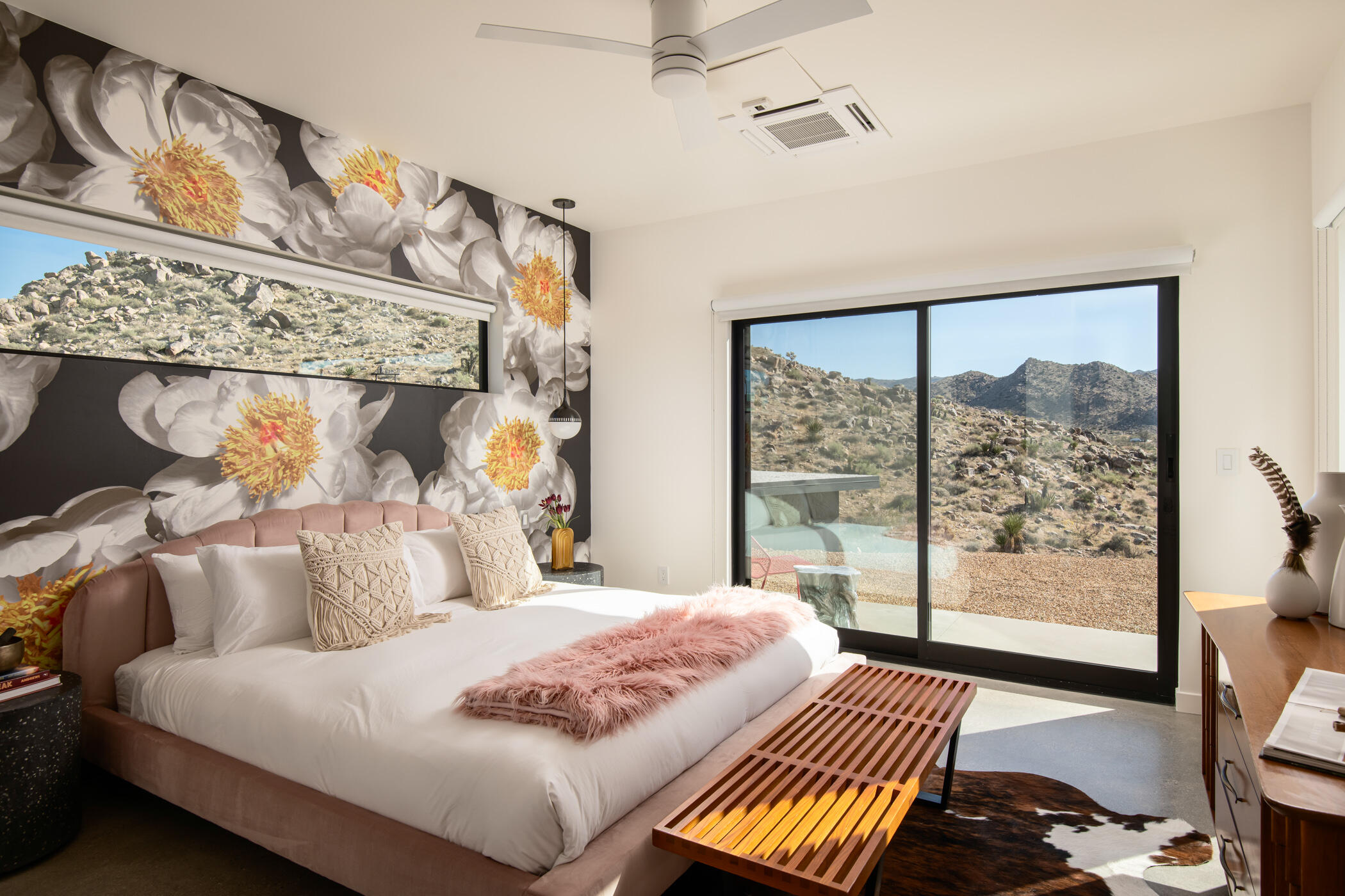 8520 Purple Sage Road Joshua Tree, CA 92252 - Photo 17 of 36 a bedroom with a bed and wooden floor