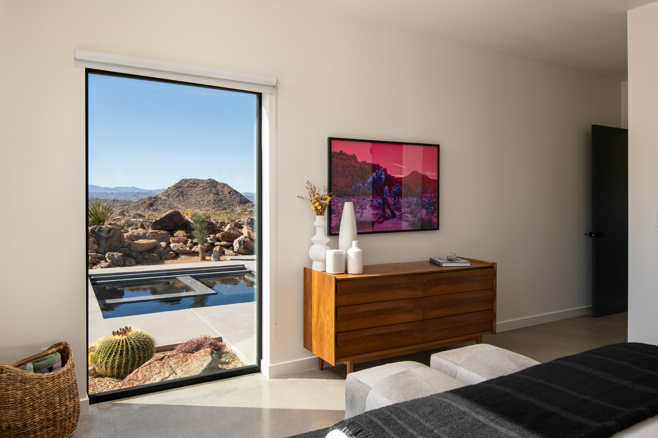 8520 Purple Sage Road Joshua Tree, CA 92252 - Photo 18 of 36 a living room with furniture and a painting on the wall