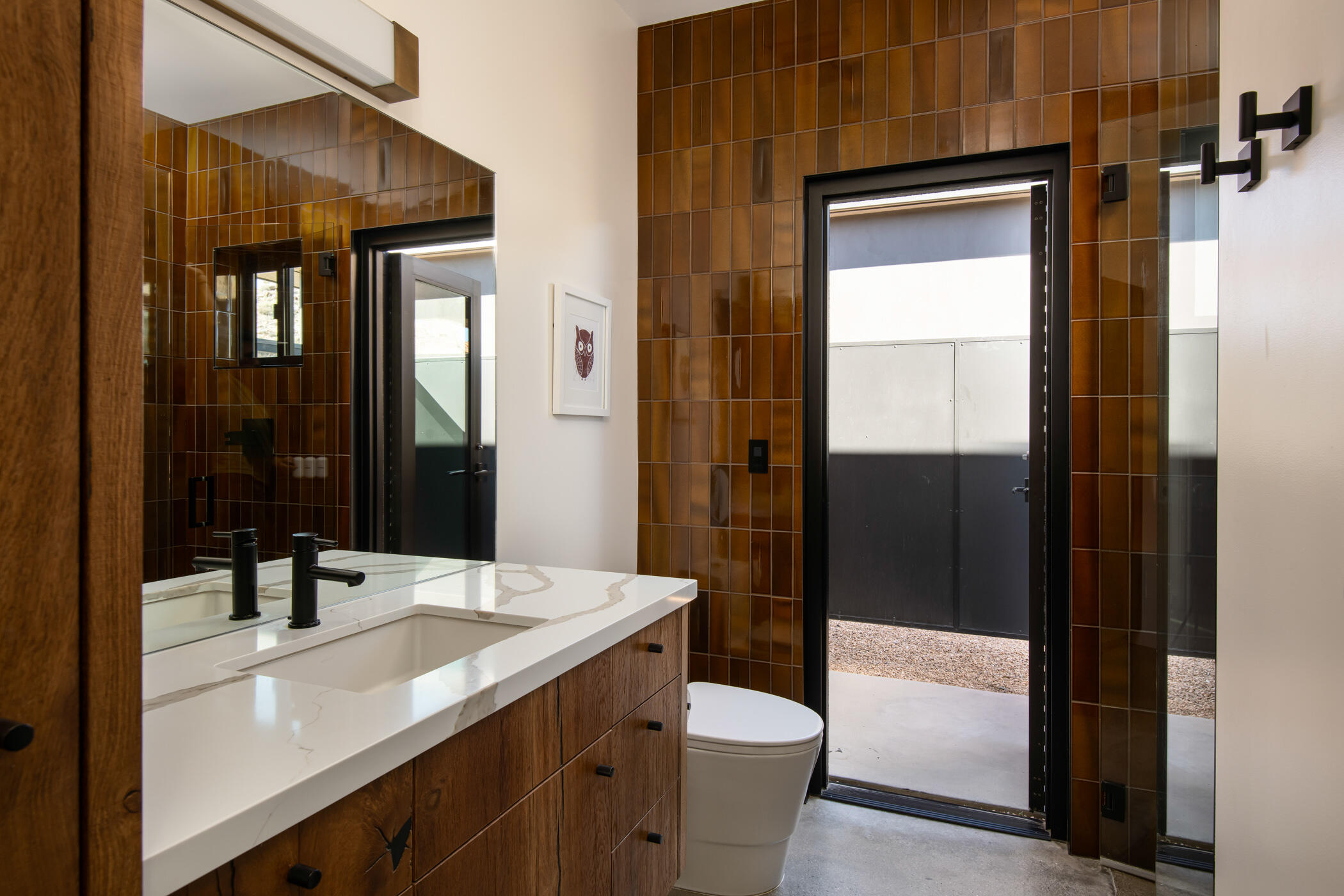 8520 Purple Sage Road Joshua Tree, CA 92252 - Photo 19 of 36 a bathroom with a sink a toilet and shower