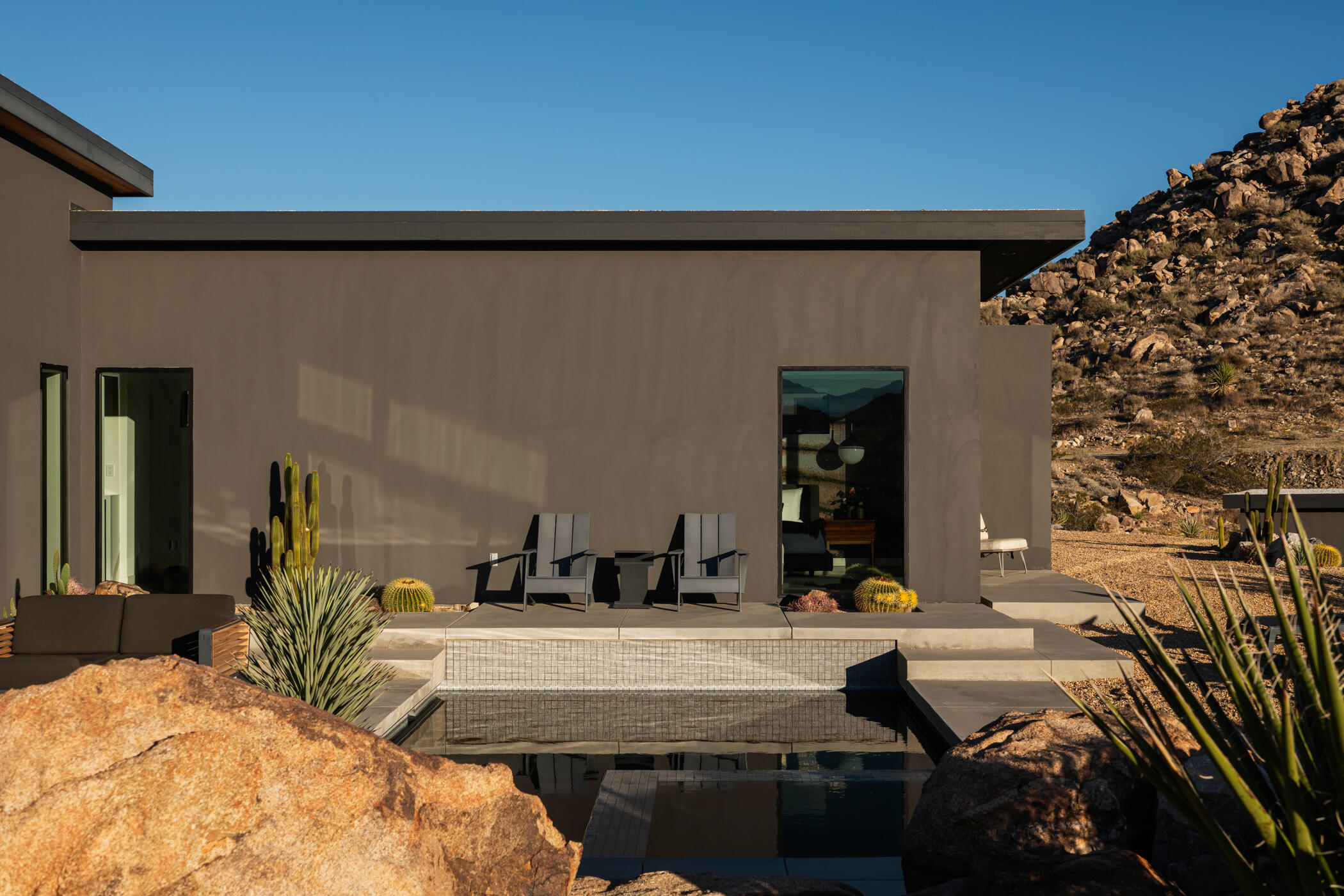 8520 Purple Sage Road Joshua Tree, CA 92252 - Photo 26 of 36 a view of swimming pool with outdoor seating