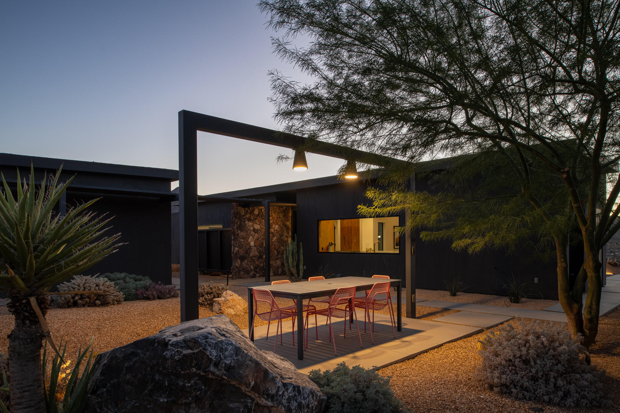 8520 Purple Sage Road Joshua Tree, CA 92252 - Photo 28 of 36 a bedroom with a bed and a potted plant