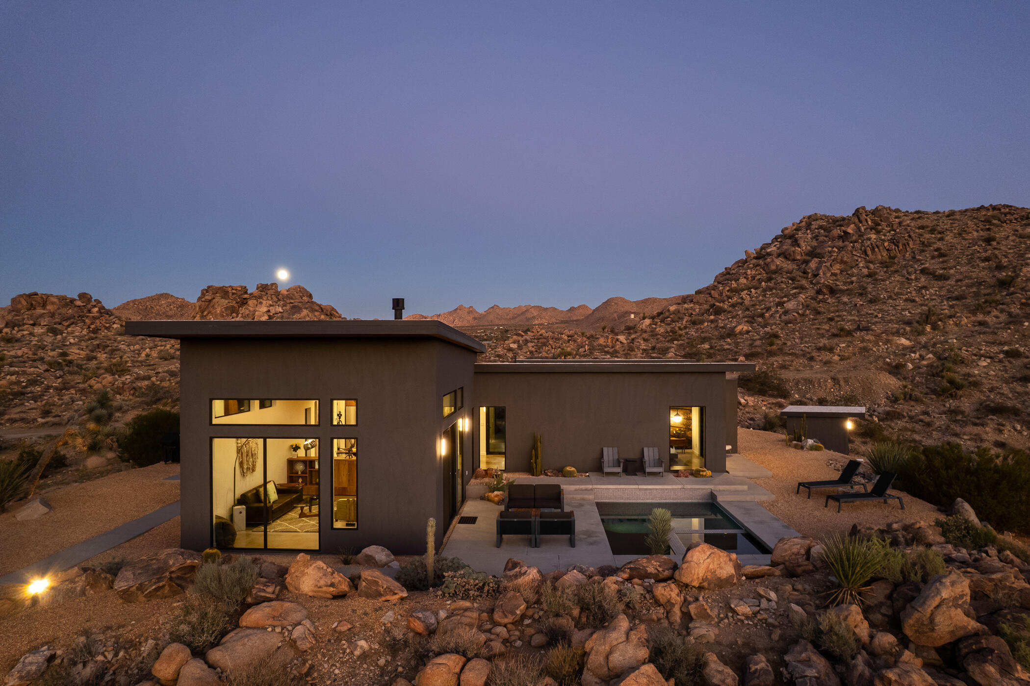 8520 Purple Sage Road Joshua Tree, CA 92252 - Photo 4 of 36 a front view of a house with a yard