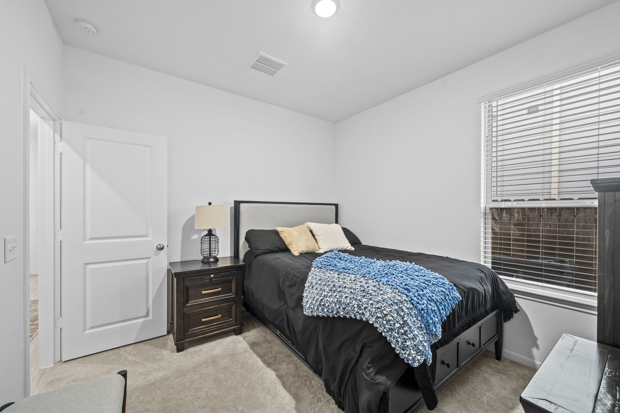 334 Maple Bark Trail Willis, TX 77378 - Photo 16 of 26 View of the third bedroom.