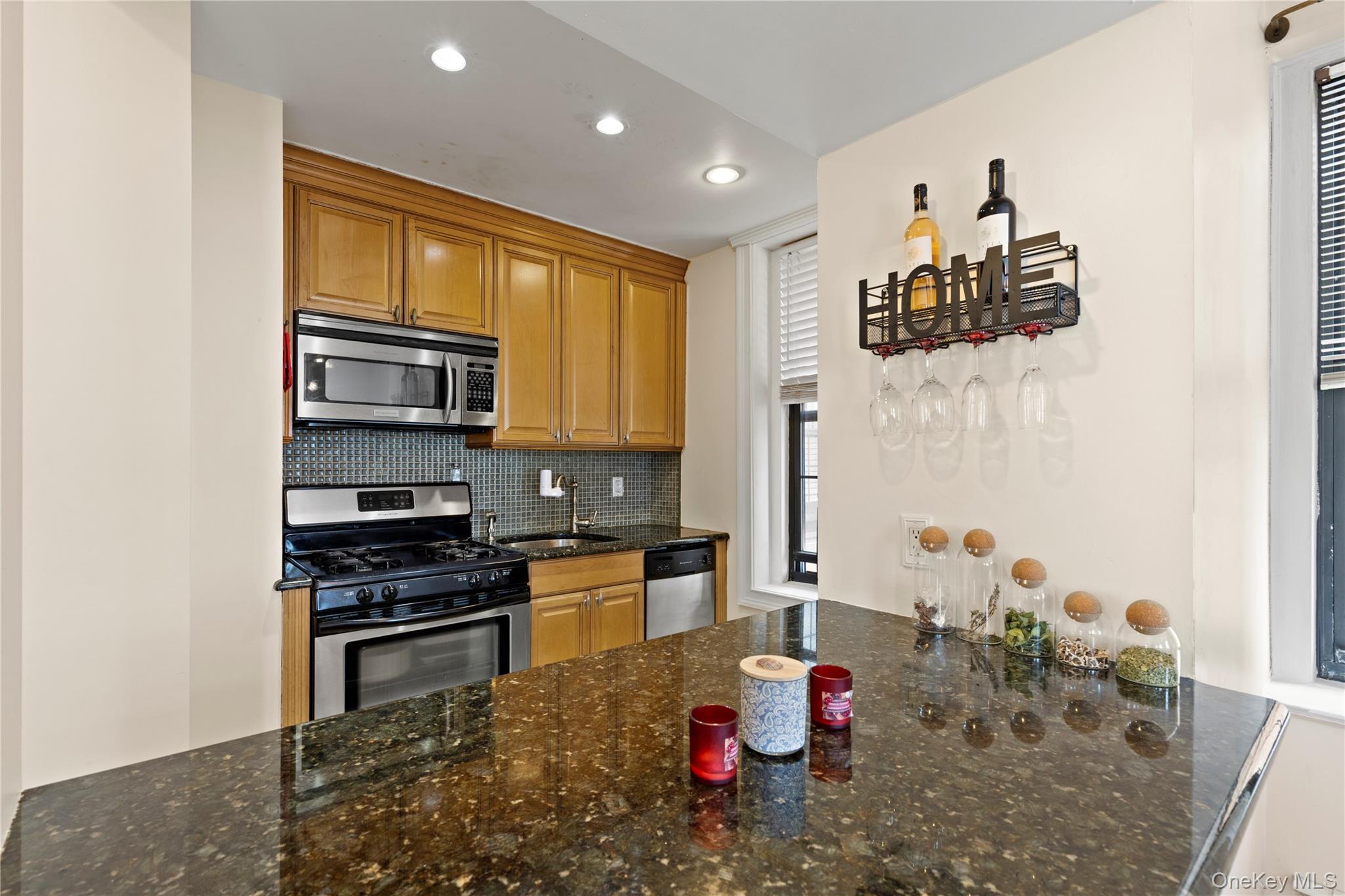 310 Riverside Boulevard, Unit 5F Long Beach, NY 11561 - Photo 6 of 23 View of kitchen from living room