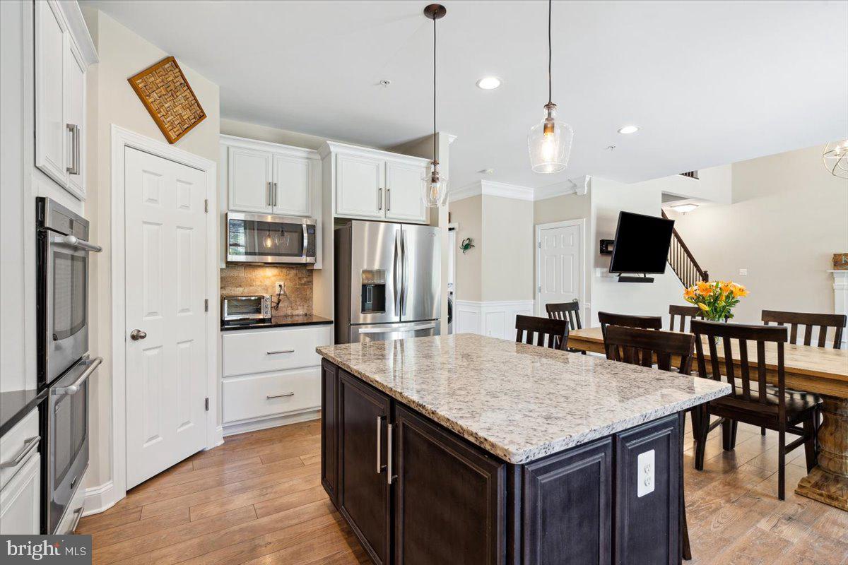7024 Fox Chase Road New Market, MD 21774 - Photo 14 of 57 Cook while entertaining guests in the family room.