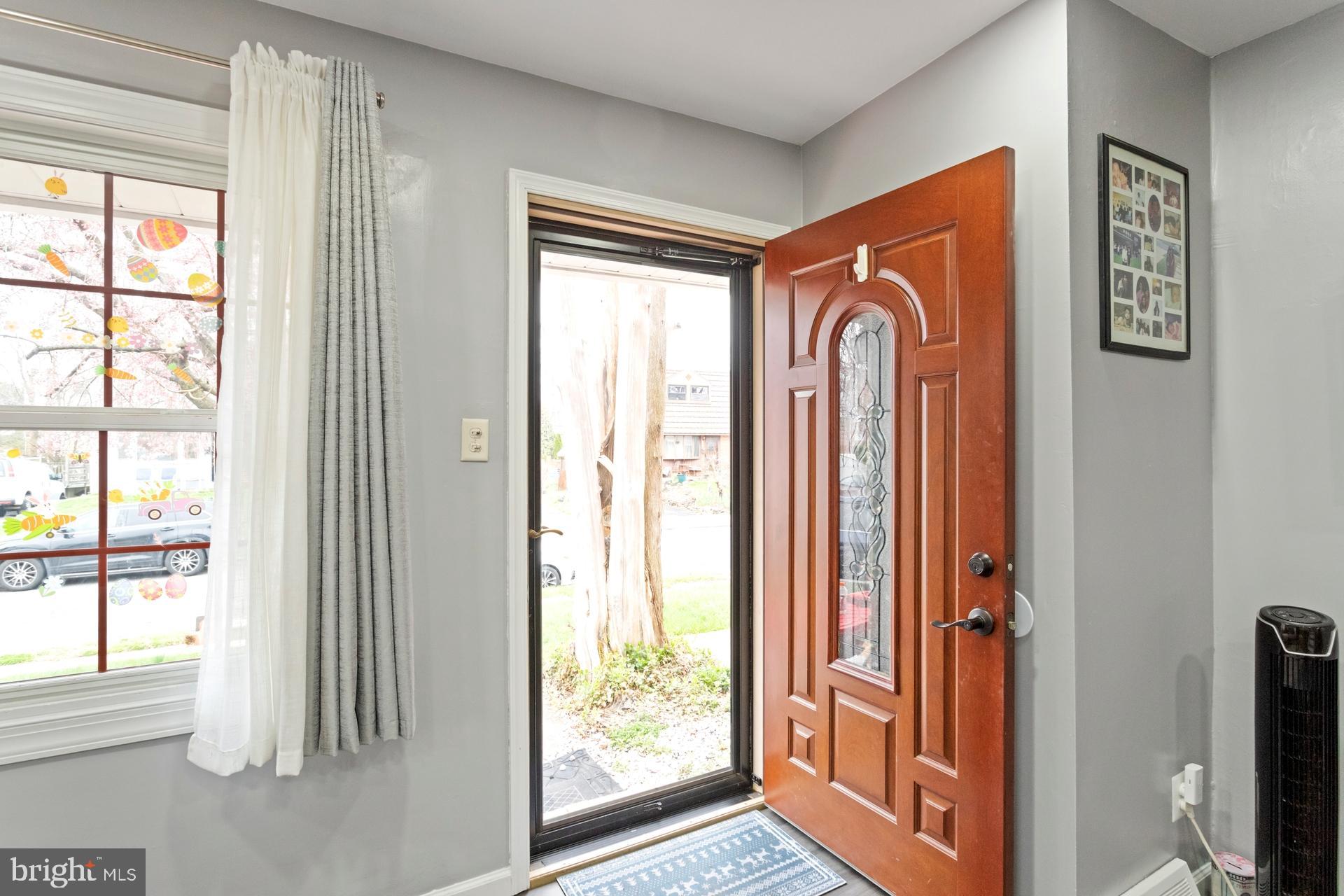1043 Foster Street Philadelphia, PA 19116 - Photo 5 of 22 a view of front door with wooden floor