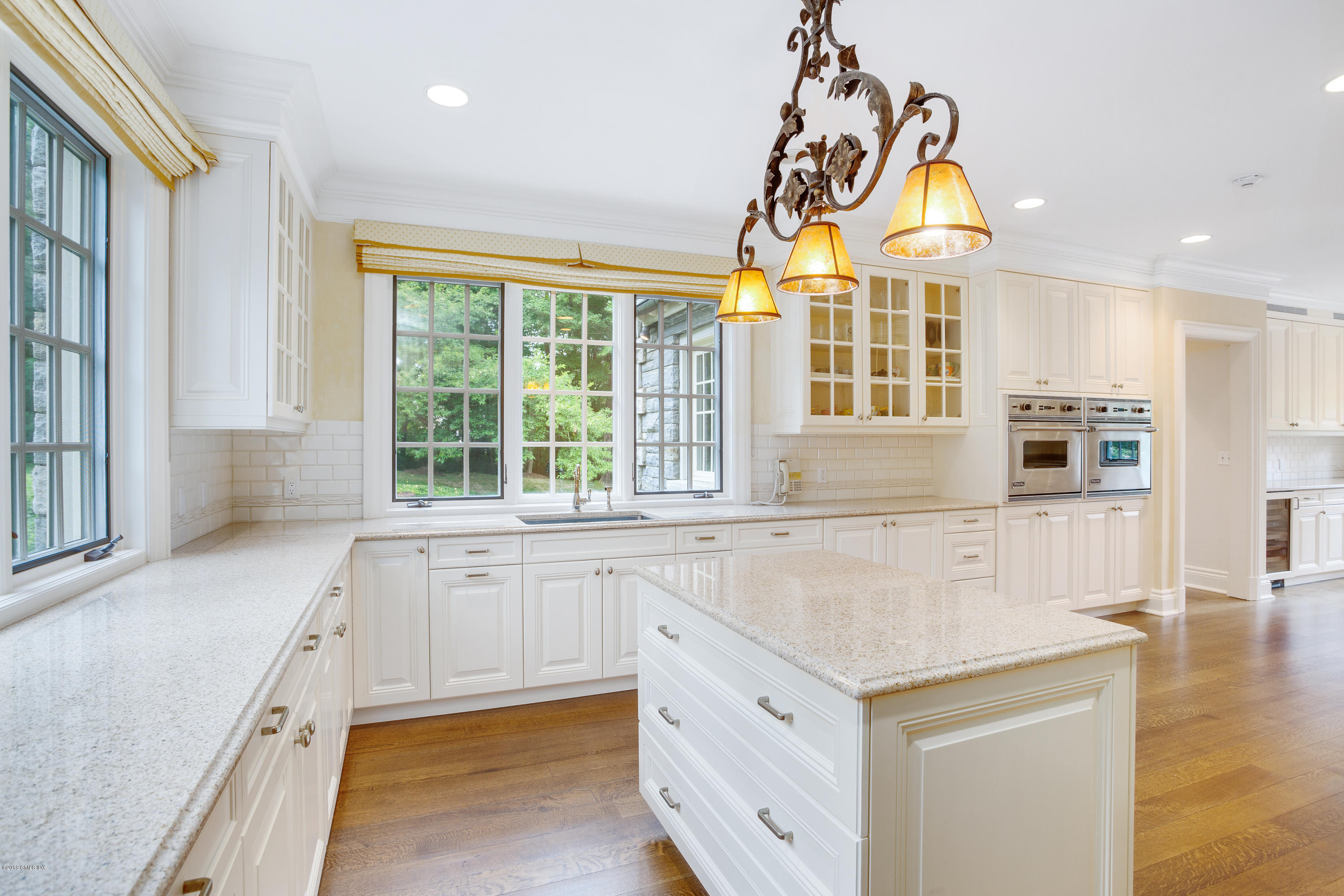 17 Cameron Drive Greenwich, CT 06831 - Photo 11 of 41 a kitchen with granite countertop a sink and a stove