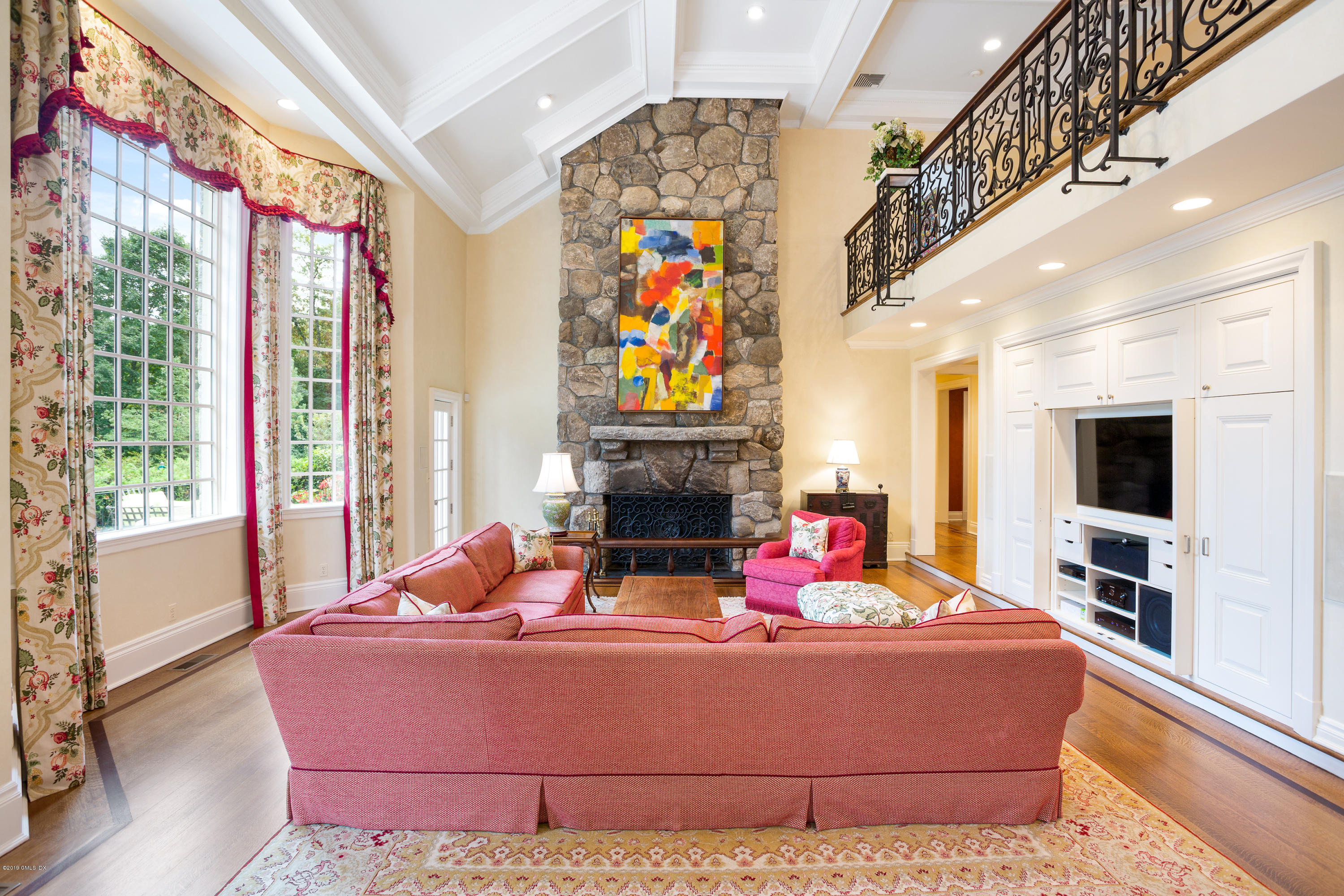 17 Cameron Drive Greenwich, CT 06831 - Photo 14 of 41 a living room with fireplace furniture and a flat screen tv