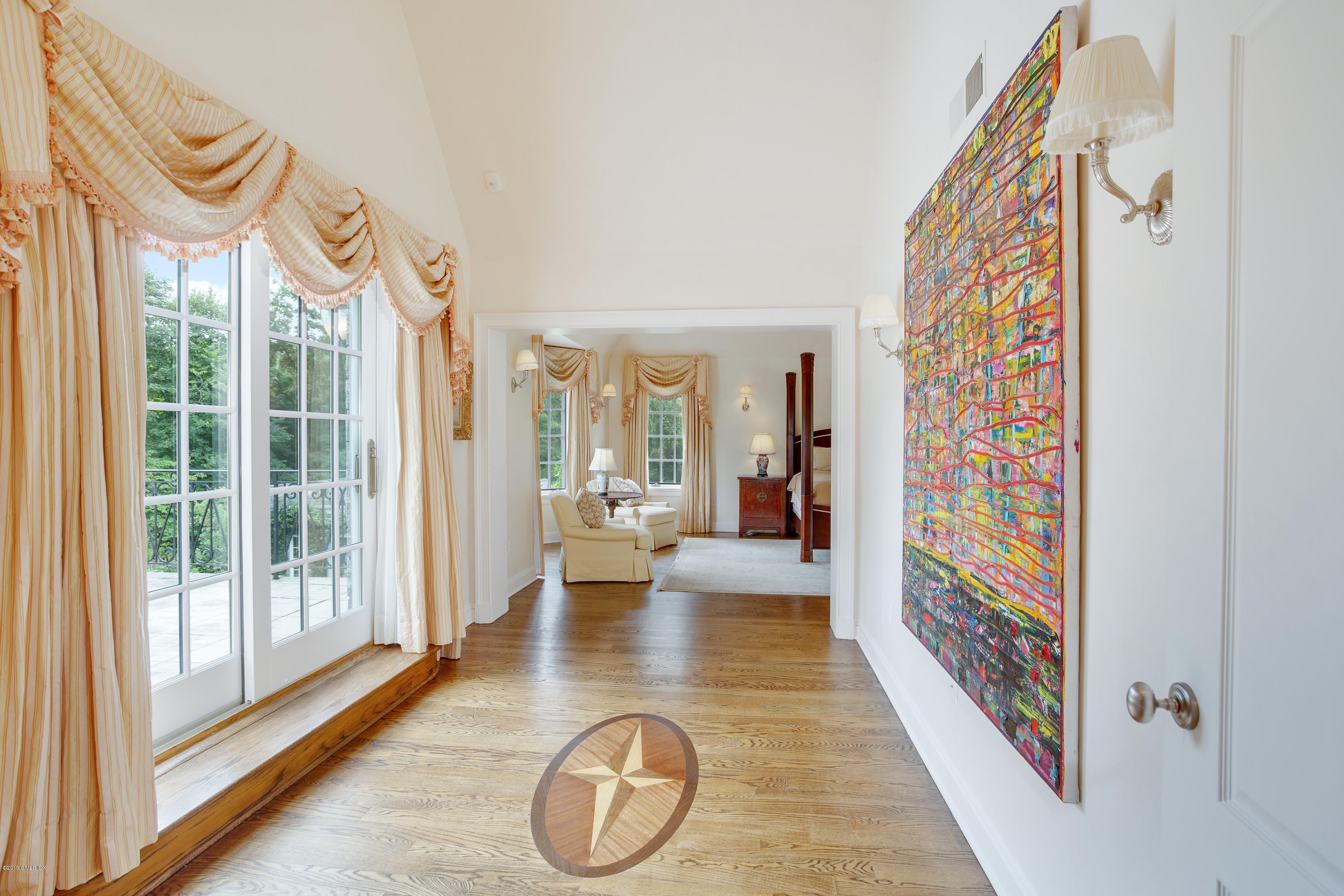 17 Cameron Drive Greenwich, CT 06831 - Photo 15 of 41 a view of an entryway with wooden floor