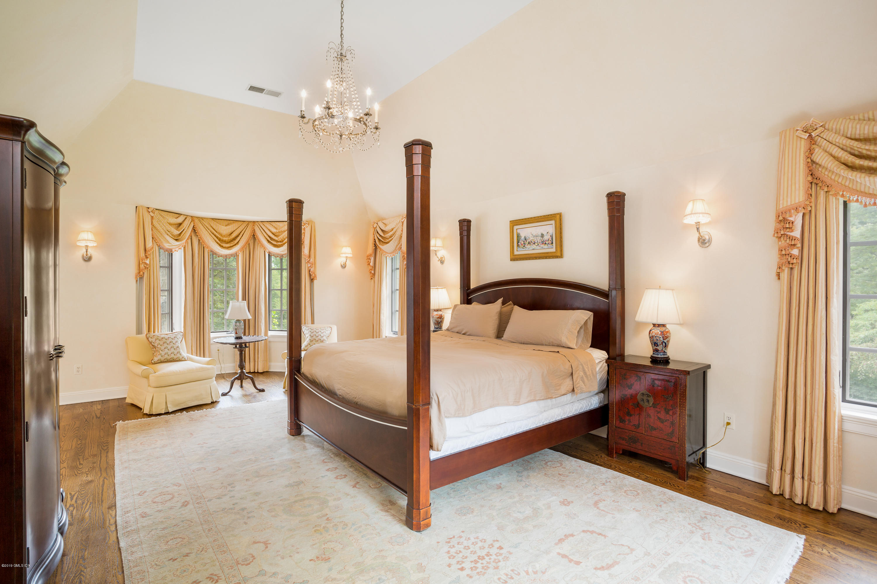 17 Cameron Drive Greenwich, CT 06831 - Photo 16 of 41 a bedroom with a bed couch and window