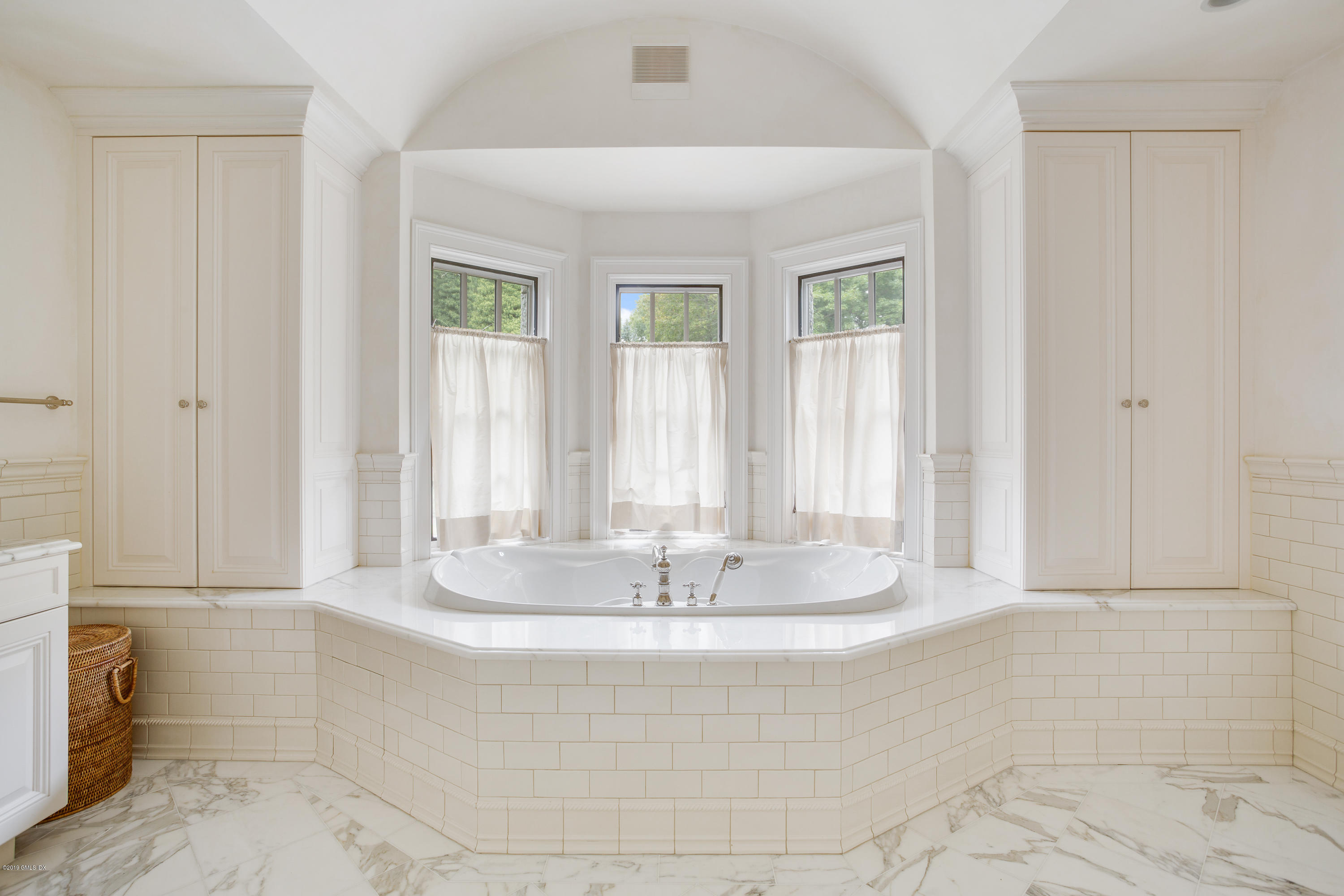 17 Cameron Drive Greenwich, CT 06831 - Photo 19 of 41 a view of bathroom with bathtub and shower