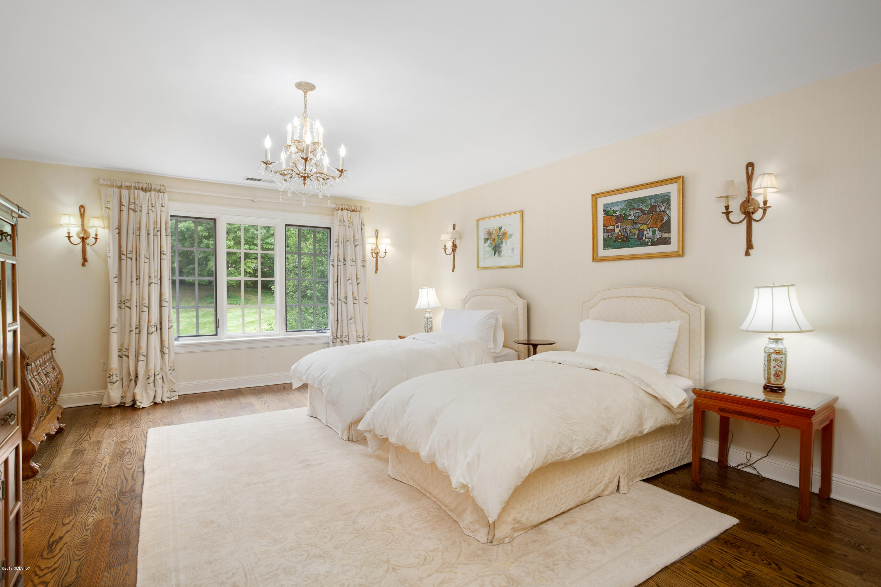 17 Cameron Drive Greenwich, CT 06831 - Photo 20 of 41 a bedroom with two beds and a window