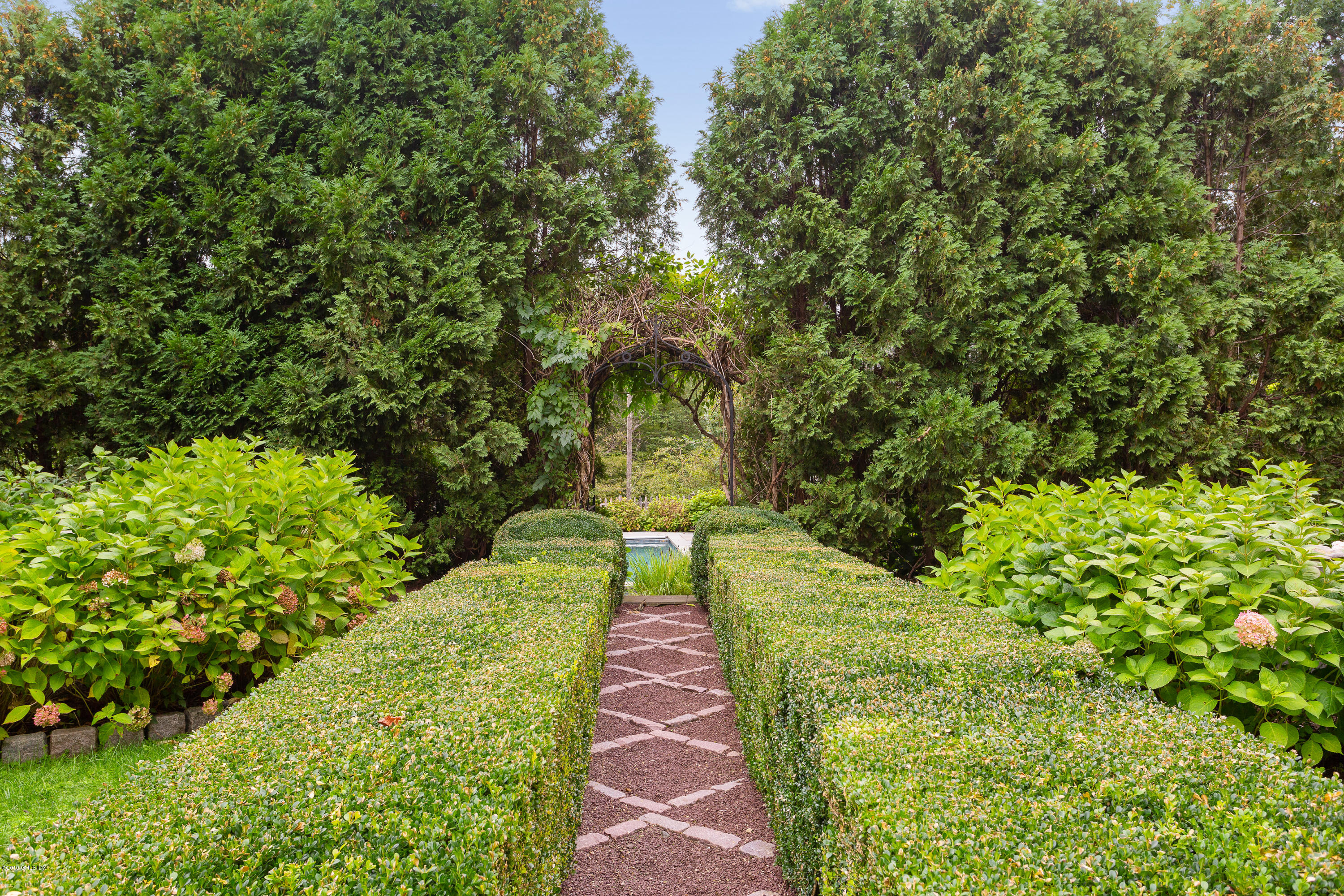 17 Cameron Drive Greenwich, CT 06831 - Photo 27 of 41 a view of a pathway both side of yard