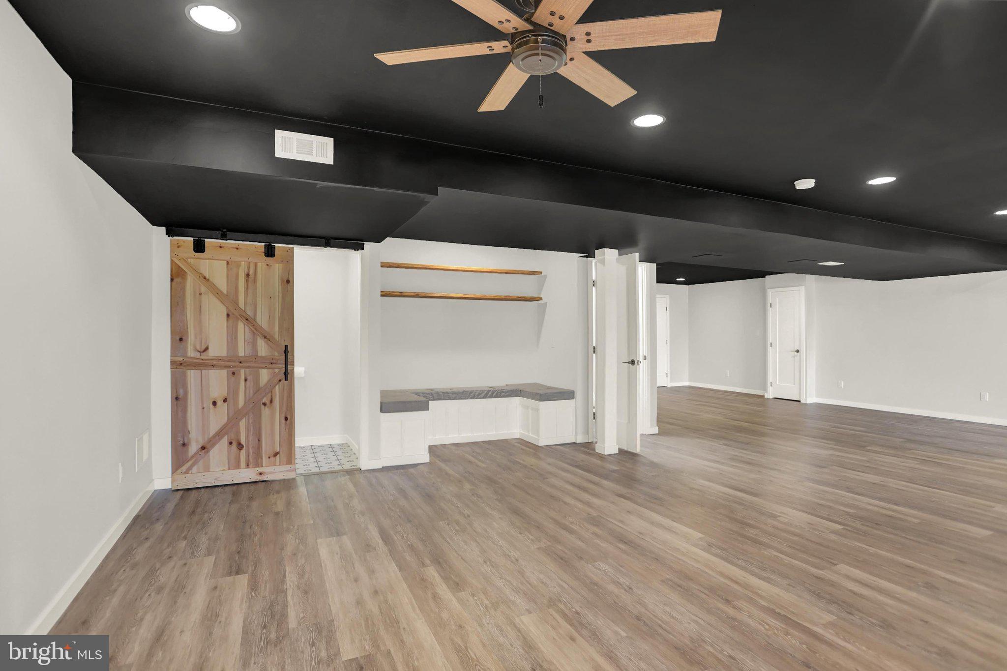 143 Spring Meadows Road Manchester, PA 17345 - Photo 32 of 48 a view of empty room with wooden floor
