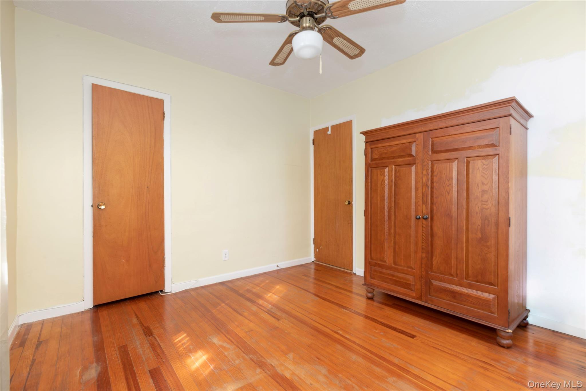 100 Marine Street Bronx, NY 10464 - Photo 15 of 25 a view of an empty room and wooden floor
